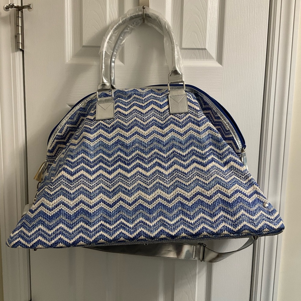 Never used weekender bag blue and white with red lining inside